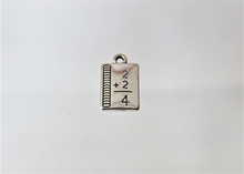 Load image into Gallery viewer, Notebook Charms, These small math notebooks do the math for you. They are a reminder of our younger years. Check them out