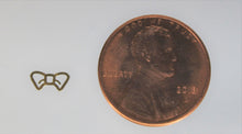 Load image into Gallery viewer, Nail Rivets, Bows - 10 pieces for 99 cents