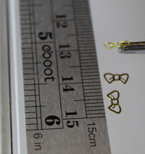Load image into Gallery viewer, Nail Rivets, Bows - 10 pieces for 99 cents