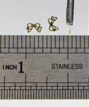 Load image into Gallery viewer, Nail Rivets, Bows - 10 pieces for 99 cents
