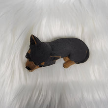Load image into Gallery viewer, Black and Tan Chihuahua figurine made of concrete.

