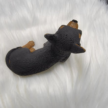 Load image into Gallery viewer, Black and Tan Chihuahua figurine made of concrete.
