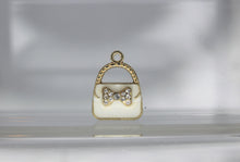 Load image into Gallery viewer, Purse Charms,  Pink, White or Black purse charms. They have a rhinestone bow in front. They are adorable. Check them out.

