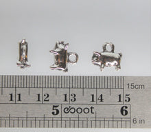 Load image into Gallery viewer, Pig Charms, These piggy charms are really cute. The chubby piggy is looking for a bite to eat. He is really tiny. Take a look.
