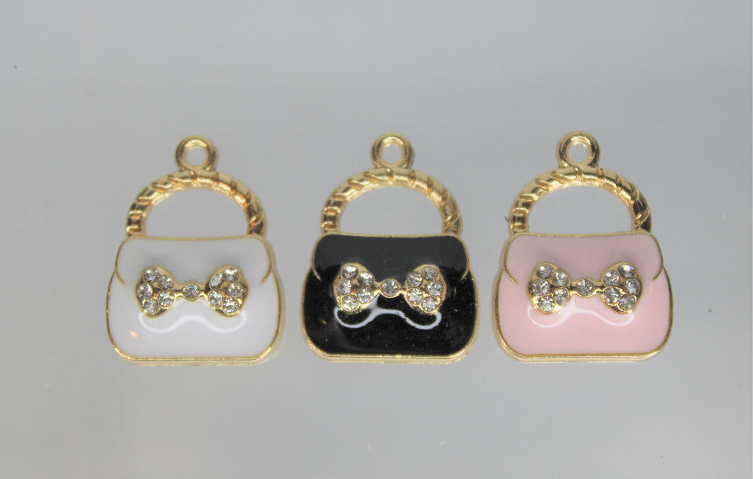 Purse Charms,  Pink, White or Black purse charms. They have a rhinestone bow in front. They are adorable. Check them out.