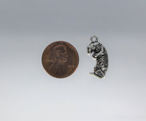 Otter Charms, These otter charms are really cute. This cute otter is floating on it's back chilling out. Take a look.