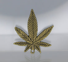 Load image into Gallery viewer, Pot Leaf Pendants, gold, silver or bronze Weed Pendants, The charms have very intricate detail and are very nice. Take a look.
